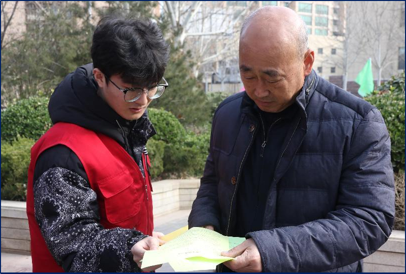 图2-3：2022.12.3志愿者在共建社区进行防诈宣传活动